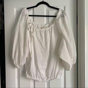 White off shoulder blouse with tie accent